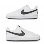 Страничен изглед на бели дамски маратонки Nike с черна емблема