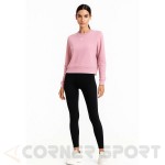 Дамска блуза Nike One Df Crew IB1450 699 в розово, носена от модел със спортен клин
